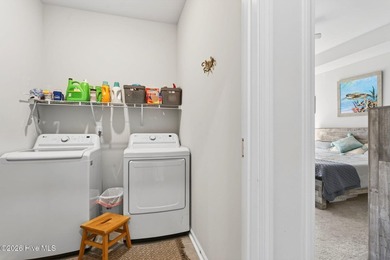 Located in the highly desirable Beach Walk community and just a on Oyster Bay Golf Links in North Carolina - for sale on GolfHomes.com, golf home, golf lot