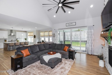 Welcome to this stunning & charming farmhouse-style home on River Golf and County Club at Lake Royale in North Carolina - for sale on GolfHomes.com, golf home, golf lot