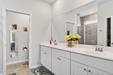 Located in the highly desirable Beach Walk community and just a on Oyster Bay Golf Links in North Carolina - for sale on GolfHomes.com, golf home, golf lot