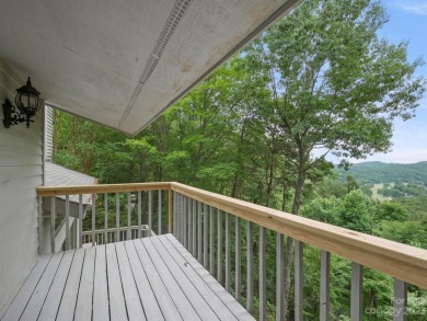 Views! Views! Located behind the security gate of Rumbling Bald on Rumbling Bald Resort on Lake Lure in North Carolina - for sale on GolfHomes.com, golf home, golf lot
