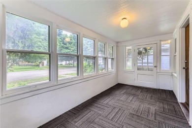 Nestled just steps from beloved Como Park, this sweet and on Como Golf Course in Minnesota - for sale on GolfHomes.com, golf home, golf lot