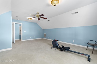 Welcome to 7401 Balmore Drive SW- your next primary residence or on Sandpiper Bay Golf and Country Club in North Carolina - for sale on GolfHomes.com, golf home, golf lot