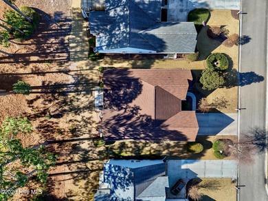 Welcome to 7401 Balmore Drive SW- your next primary residence or on Sandpiper Bay Golf and Country Club in North Carolina - for sale on GolfHomes.com, golf home, golf lot