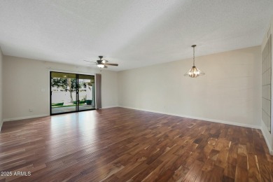 BEAUTIFUL ACAIA WOOD FLOORS greet you upon entering this 2 on Fountain of the Sun Country Club in Arizona - for sale on GolfHomes.com, golf home, golf lot