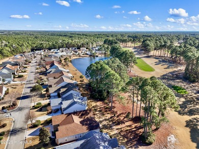 Welcome to 7401 Balmore Drive SW- your next primary residence or on Sandpiper Bay Golf and Country Club in North Carolina - for sale on GolfHomes.com, golf home, golf lot
