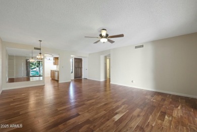 BEAUTIFUL ACAIA WOOD FLOORS greet you upon entering this 2 on Fountain of the Sun Country Club in Arizona - for sale on GolfHomes.com, golf home, golf lot