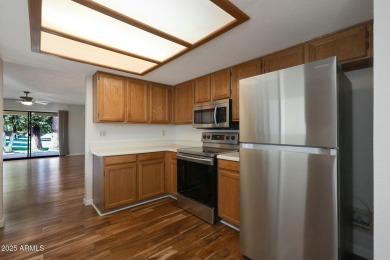 BEAUTIFUL ACAIA WOOD FLOORS greet you upon entering this 2 on Fountain of the Sun Country Club in Arizona - for sale on GolfHomes.com, golf home, golf lot