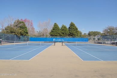 Welcome to 7401 Balmore Drive SW- your next primary residence or on Sandpiper Bay Golf and Country Club in North Carolina - for sale on GolfHomes.com, golf home, golf lot