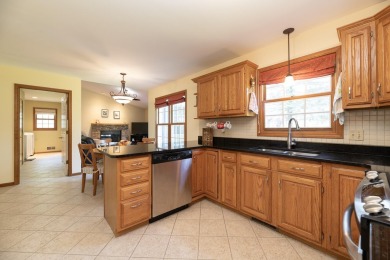 Welcome home to this beautiful and meticulously maintained home on The Moors Golf Club in Michigan - for sale on GolfHomes.com, golf home, golf lot