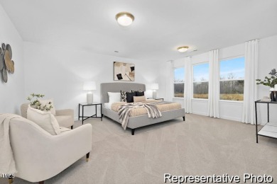 This semi-custom home in Lake Royale offers 3BR/2.5BA and over 2 on River Golf and County Club at Lake Royale in North Carolina - for sale on GolfHomes.com, golf home, golf lot