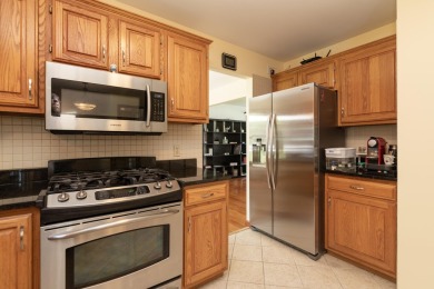 Welcome home to this beautiful and meticulously maintained home on The Moors Golf Club in Michigan - for sale on GolfHomes.com, golf home, golf lot