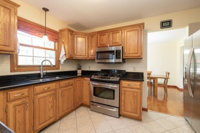 Welcome home to this beautiful and meticulously maintained home on The Moors Golf Club in Michigan - for sale on GolfHomes.com, golf home, golf lot