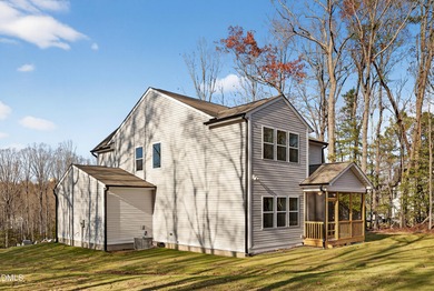 This semi-custom home in Lake Royale offers 3BR/2.5BA and over 2 on River Golf and County Club at Lake Royale in North Carolina - for sale on GolfHomes.com, golf home, golf lot