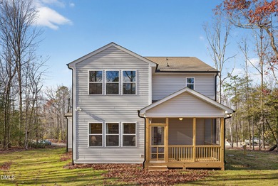 This semi-custom home in Lake Royale offers 3BR/2.5BA and over 2 on River Golf and County Club at Lake Royale in North Carolina - for sale on GolfHomes.com, golf home, golf lot