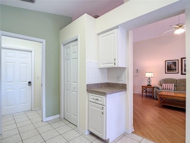 Welcome home to this picture-perfect 3-bedroom, 2-bathroom gem on Meadow Oaks Golf and Country Club in Florida - for sale on GolfHomes.com, golf home, golf lot