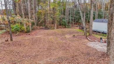 Situated on the 17th green of the renowned Brickshire Golf on Brickshire Golf Club in Virginia - for sale on GolfHomes.com, golf home, golf lot