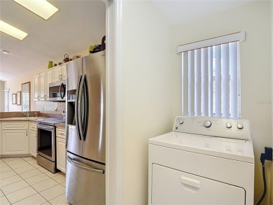 Welcome home to this picture-perfect 3-bedroom, 2-bathroom gem on Meadow Oaks Golf and Country Club in Florida - for sale on GolfHomes.com, golf home, golf lot