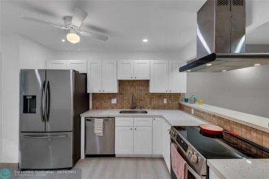 Spacious and beautifully updated 2-bedroom, 2-bathroom on Palm-Aire Country Club and Resort - Palms in Florida - for sale on GolfHomes.com, golf home, golf lot