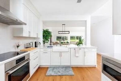 This beautifully renovated 3-bedroom Murifield townhome offers a on Palm Beach Polo and Country Club in Florida - for sale on GolfHomes.com, golf home, golf lot