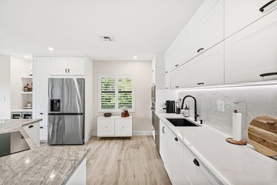 Tranquil golf course views from this 2-bedroom, 2-bath on Quail Ridge Golf Course and Country Club in Florida - for sale on GolfHomes.com, golf home, golf lot