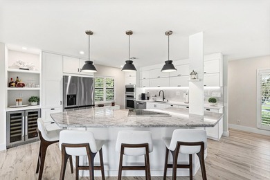 Tranquil golf course views from this 2-bedroom, 2-bath on Quail Ridge Golf Course and Country Club in Florida - for sale on GolfHomes.com, golf home, golf lot