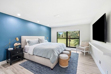 Tranquil golf course views from this 2-bedroom, 2-bath on Quail Ridge Golf Course and Country Club in Florida - for sale on GolfHomes.com, golf home, golf lot