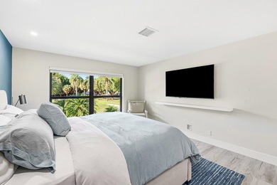 Tranquil golf course views from this 2-bedroom, 2-bath on Quail Ridge Golf Course and Country Club in Florida - for sale on GolfHomes.com, golf home, golf lot