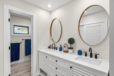 Tranquil golf course views from this 2-bedroom, 2-bath on Quail Ridge Golf Course and Country Club in Florida - for sale on GolfHomes.com, golf home, golf lot