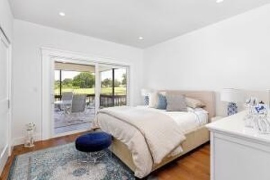 This beautifully renovated 3-bedroom Murifield townhome offers a on Palm Beach Polo and Country Club in Florida - for sale on GolfHomes.com, golf home, golf lot