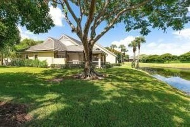 This beautifully renovated 3-bedroom Murifield townhome offers a on Palm Beach Polo and Country Club in Florida - for sale on GolfHomes.com, golf home, golf lot