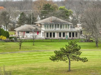 Welcome to 17867 Yorkshire Drive, an architectural masterpiece on Riverview Highlands Golf Club  in Michigan - for sale on GolfHomes.com, golf home, golf lot