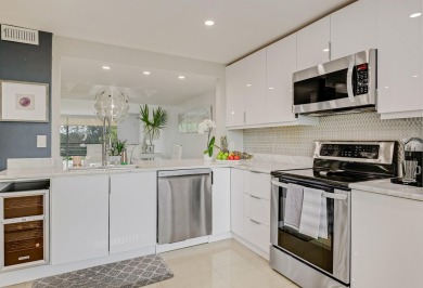 WELCOME TO THIS BEAUTIFUL UPGRADED  TOP FLOOR CONDO WITH  ITS on Poinciana Golf Club in Florida - for sale on GolfHomes.com, golf home, golf lot