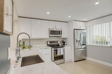 WELCOME TO THIS BEAUTIFUL UPGRADED TOP FLOOR CONDO WITH ITS OPEN on Poinciana Golf Club in Florida - for sale on GolfHomes.com, golf home, golf lot