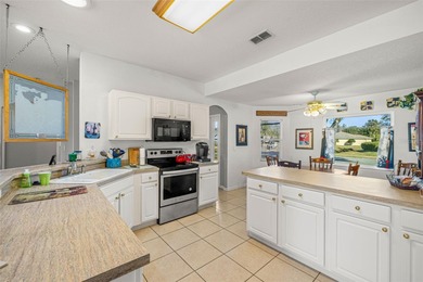 A POPULAR LAGUNA OPEN, SPLIT FLOOR PLAN, WITH 3 BEDROOMS, 2 on Tampa Bay Golf and Country Club in Florida - for sale on GolfHomes.com, golf home, golf lot