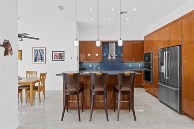 Expanded Brittany model with 2,980 sq ft under air offers a on Boca Woods Country Club in Florida - for sale on GolfHomes.com, golf home, golf lot