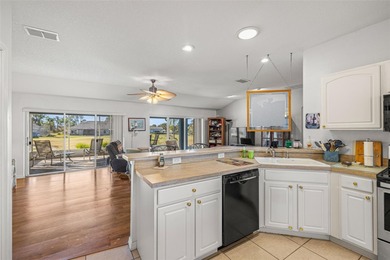 A POPULAR LAGUNA OPEN, SPLIT FLOOR PLAN, WITH 3 BEDROOMS, 2 on Tampa Bay Golf and Country Club in Florida - for sale on GolfHomes.com, golf home, golf lot
