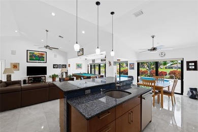 Expanded Brittany model with 2,980 sq ft under air offers a on Boca Woods Country Club in Florida - for sale on GolfHomes.com, golf home, golf lot