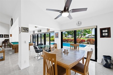 Expanded Brittany model with 2,980 sq ft under air offers a on Boca Woods Country Club in Florida - for sale on GolfHomes.com, golf home, golf lot