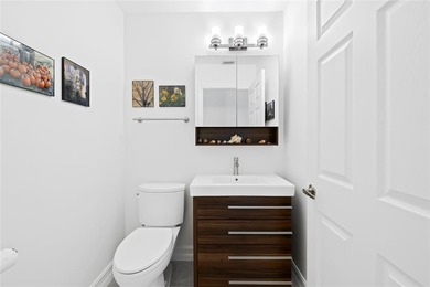 Expanded Brittany model with 2,980 sq ft under air offers a on Boca Woods Country Club in Florida - for sale on GolfHomes.com, golf home, golf lot