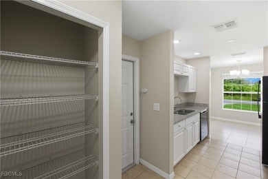 Nestled on a private corner lot, this 3-bedroom, 2-bath home on River Hall Country Club in Florida - for sale on GolfHomes.com, golf home, golf lot