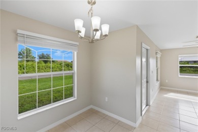 Nestled on a private corner lot, this 3-bedroom, 2-bath home on River Hall Country Club in Florida - for sale on GolfHomes.com, golf home, golf lot