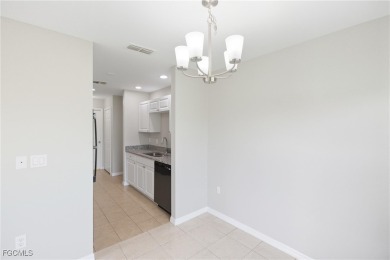 Nestled on a private corner lot, this 3-bedroom, 2-bath home on River Hall Country Club in Florida - for sale on GolfHomes.com, golf home, golf lot