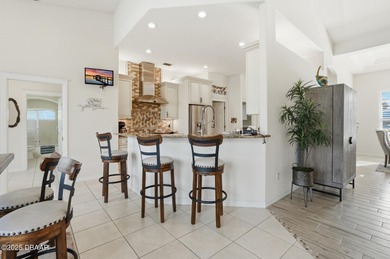 Experience the best of Florida waterfront living in this on The Ocean Course At Hammock Beach Resort in Florida - for sale on GolfHomes.com, golf home, golf lot