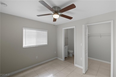 Nestled on a private corner lot, this 3-bedroom, 2-bath home on River Hall Country Club in Florida - for sale on GolfHomes.com, golf home, golf lot