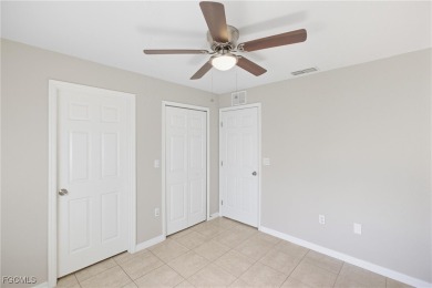 Nestled on a private corner lot, this 3-bedroom, 2-bath home on River Hall Country Club in Florida - for sale on GolfHomes.com, golf home, golf lot