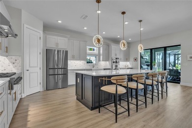 Welcome to this breathtaking Palazzio GOLF DEEDED model with on Esplanade Golf and Country at Lakewood Ranch in Florida - for sale on GolfHomes.com, golf home, golf lot