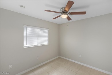 Nestled on a private corner lot, this 3-bedroom, 2-bath home on River Hall Country Club in Florida - for sale on GolfHomes.com, golf home, golf lot