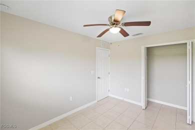 Nestled on a private corner lot, this 3-bedroom, 2-bath home on River Hall Country Club in Florida - for sale on GolfHomes.com, golf home, golf lot