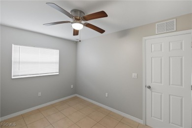 Nestled on a private corner lot, this 3-bedroom, 2-bath home on River Hall Country Club in Florida - for sale on GolfHomes.com, golf home, golf lot