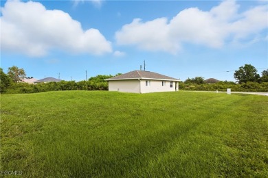 Nestled on a private corner lot, this 3-bedroom, 2-bath home on River Hall Country Club in Florida - for sale on GolfHomes.com, golf home, golf lot